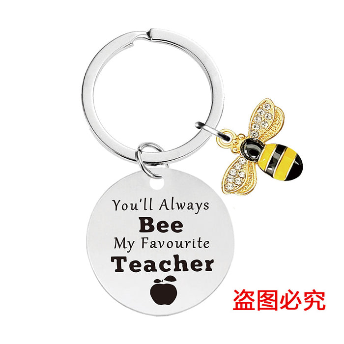 Wholesale Little Bee Thanksgiving Teacher's Day Alloy Keychain JDC-KC-GangGu048