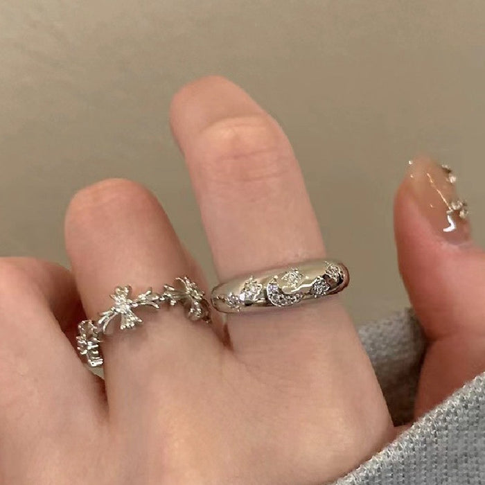 Wholesale Set of open-faced diamond-encrusted heart-shaped rings.