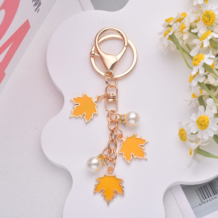 Wholesale Maple Leaf Pearl Pendant Alloy Keychain JDC-KC-Jiax002