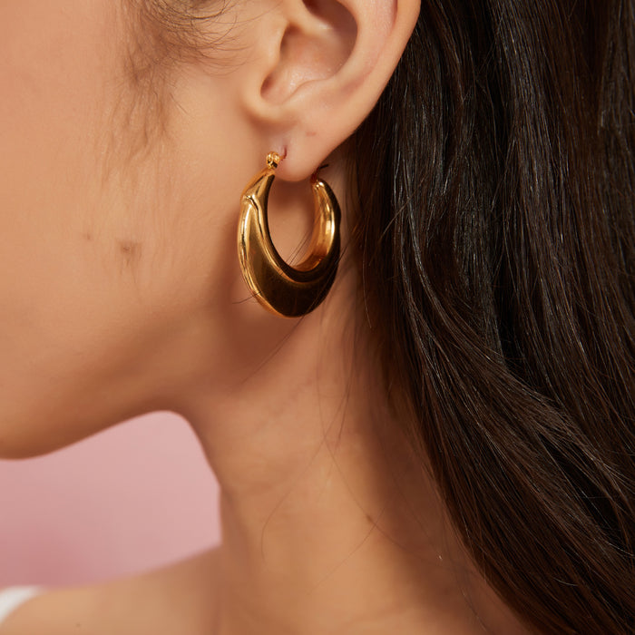 Wholesale Peach heart stainless steel hollow earrings with fashionable temperament, geometric smooth surface earrings, color preservation electroplating