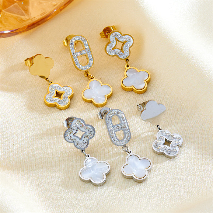 Wholesale Three four-leaf clover-shaped earrings with diamond embellishments.
