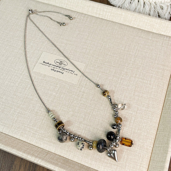 Wholesale Heart-shaped pendant adjustable length sweater chain stainless steel necklace