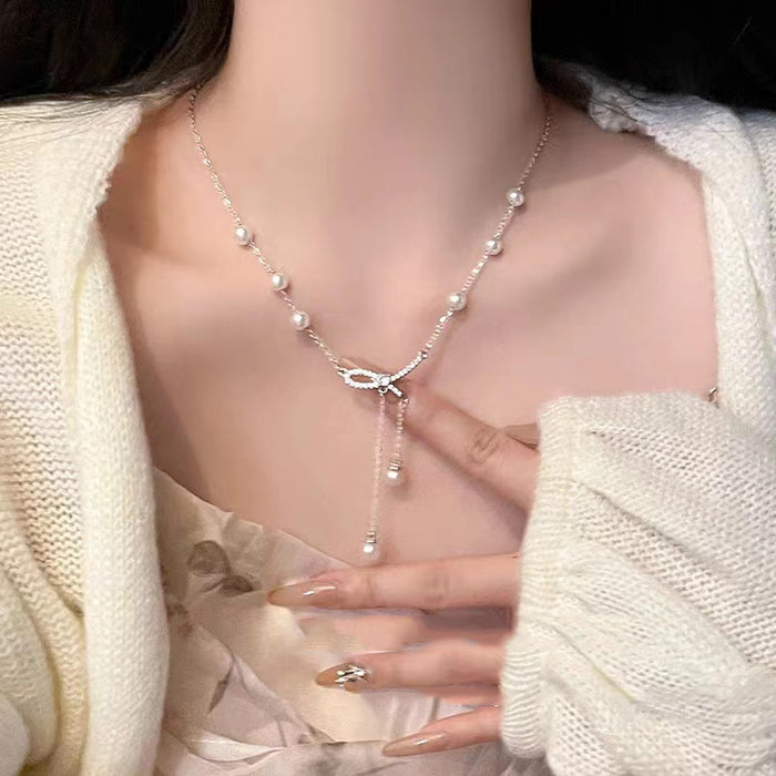 Wholesale Titanium steel necklace bow pearl collarbone chain temperament versatile niche bead sweater chain