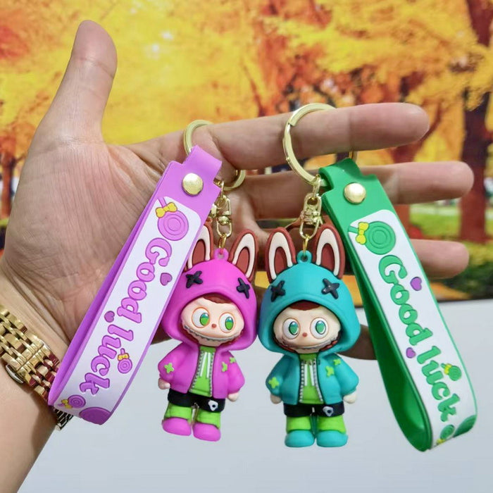 Wholesale Cute cartoon trendy schoolbag pendant keychain furry cute little monster