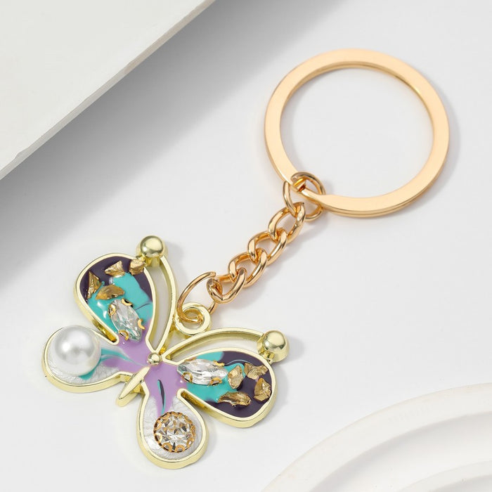 Wholesale Alloy Inlaid Diamond Pearl Butterfly Keychain JDC-KC-RongRui066