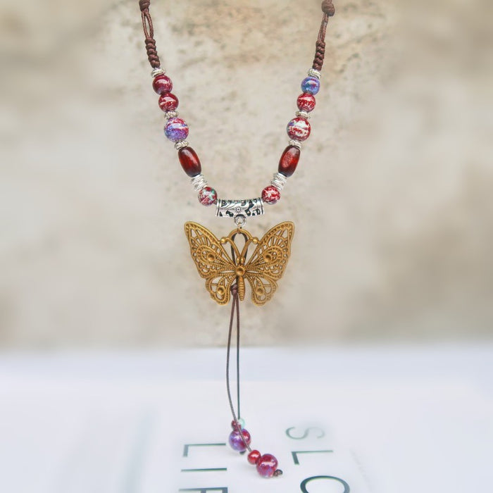 Wholesale Long sweater chain women's pendant retro butterfly necklace