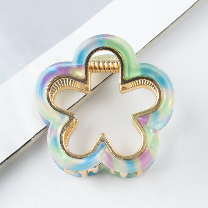 Wholesale Small flower shaped hair clip accessory with metal alloy grip