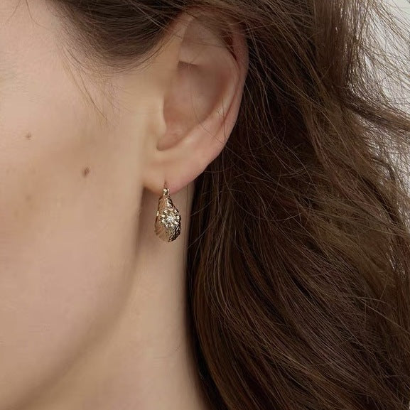Wholesale Three Horizontal Accessories'  Same Style " Garden"  Titanium Gold  Woven Flower Basket Ear Clips with a Vintage Design