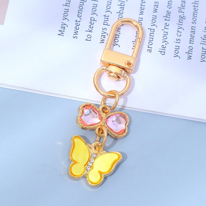 Wholesale Keychain Pendant Creative Alloy Butterfly Headphone Mobile Phone Bag Pendant