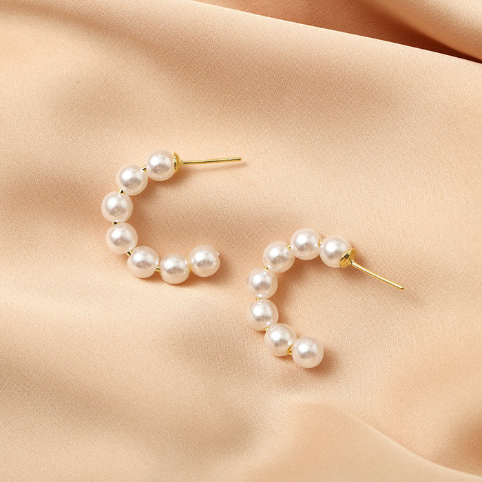 Wholesale Circle pearl earrings with a high-end feel, new round earrings, and earrings