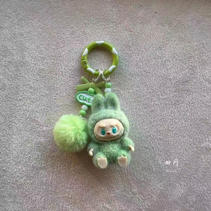 Wholesale Cute mini flocked sitting posture toy