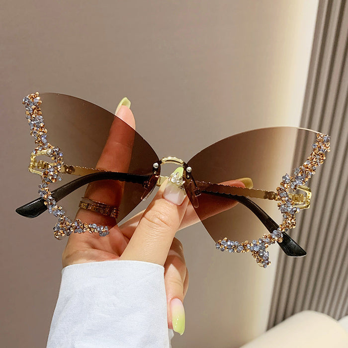 Wholesale Butterfly Shape Diamond Frameless PC Sunglasses JDC-SG-MNY001