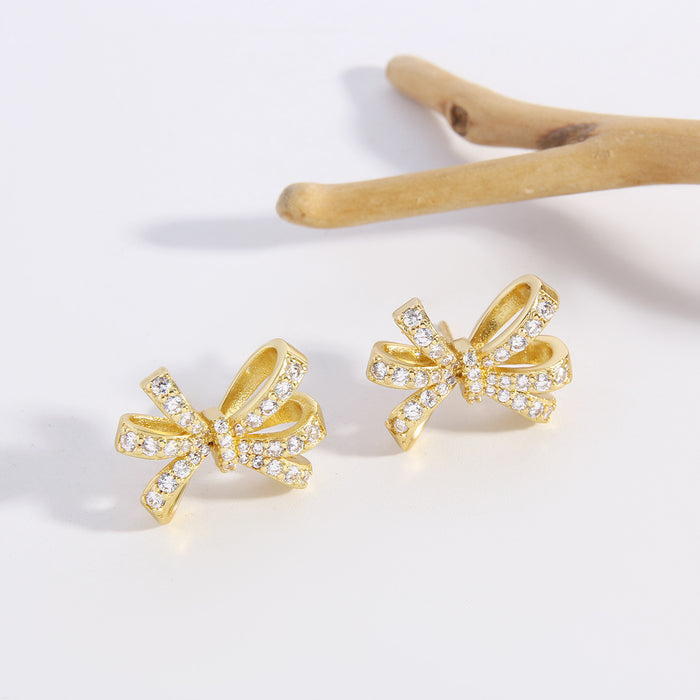 Wholesale Irregular Hollow Zircon Copper Bow Earrings JDC-ES-BaiTian006