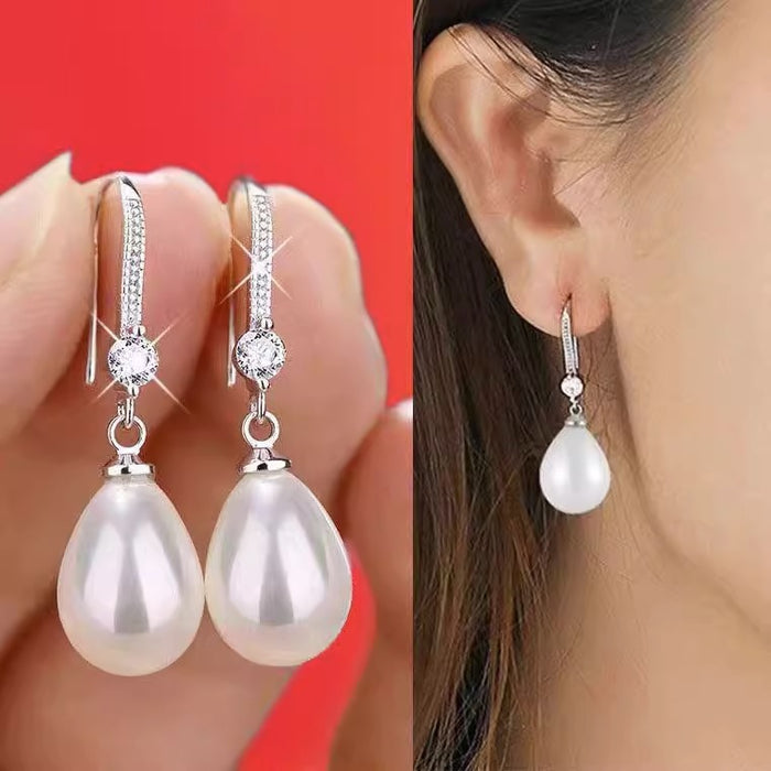 Wholesale Pure silver earrings with temperament, pearl earrings with hooks, long style, atmospheric and high-end earrings