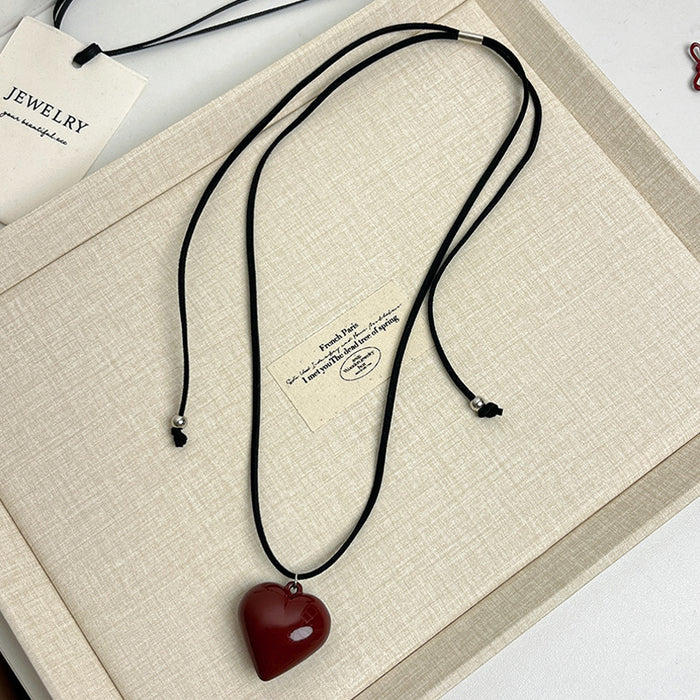 Wholesale Love pendant necklace, long leather rope adjustable sweater chain, high-end sweatshirt accessory