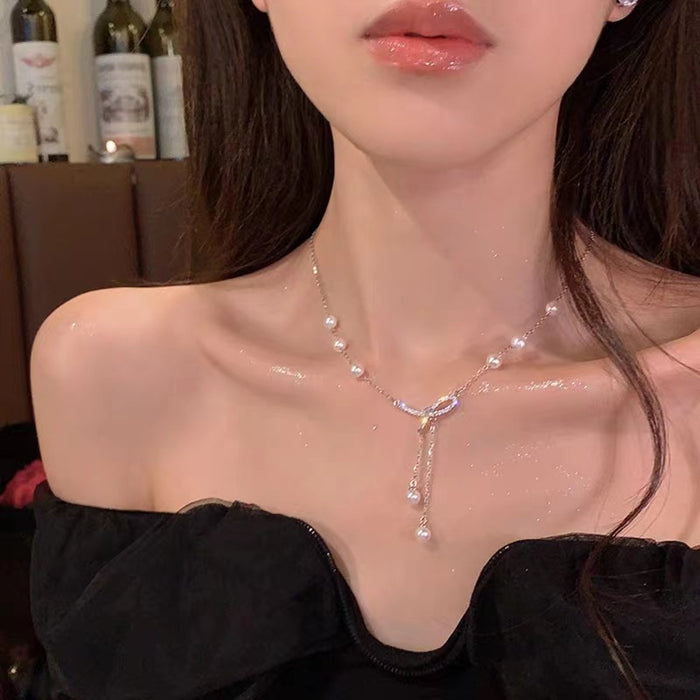 Wholesale Titanium steel necklace bow pearl collarbone chain temperament versatile niche bead sweater chain