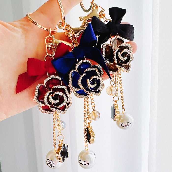 Wholesale Rhinestone Bow Pearl Tassel Camellia Zinc Alloy Keychain JDC-KC-ZhanLun014