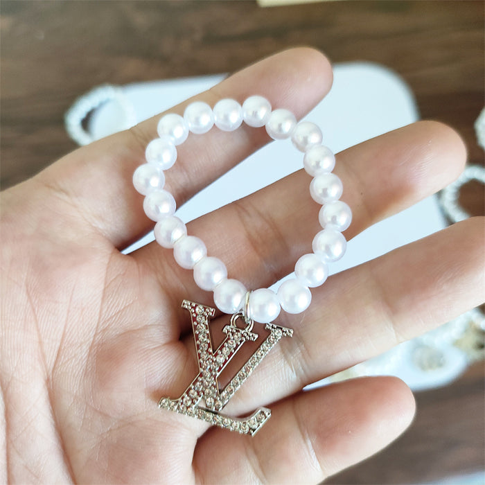 Wholesale Pendant with diamond pendant,  pearl necklace accessories,  baby clothes