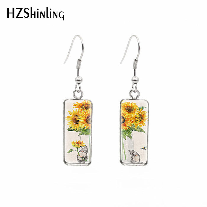 Wholesale Independently packaged hook flower pendant earrings, creative time gemstone earrings
