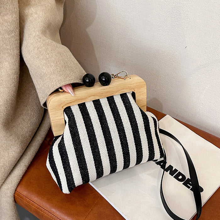 Wholesale Women' s striped canvas shoulder bag with wooden clasp
