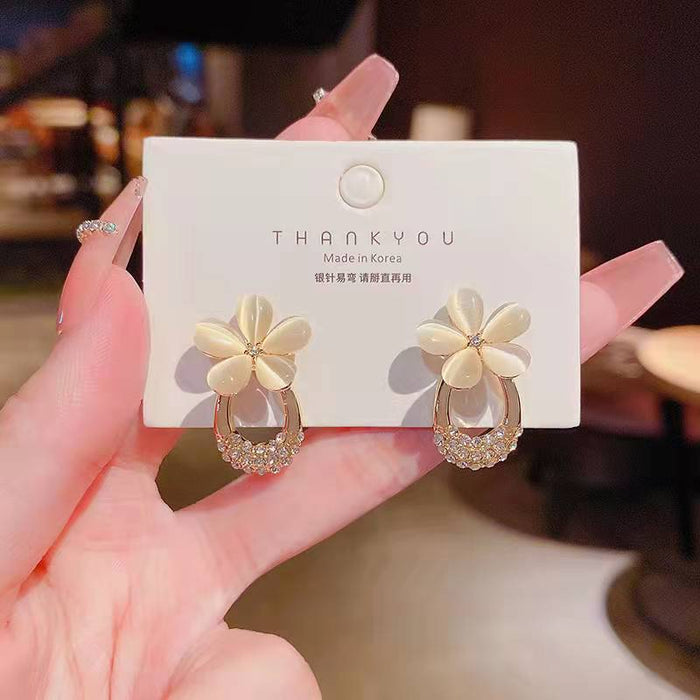 Wholesale Exquisite and compact diamond studded earrings with gentle temperament, flower cat eye stone earrings, high-end earrings wholesale