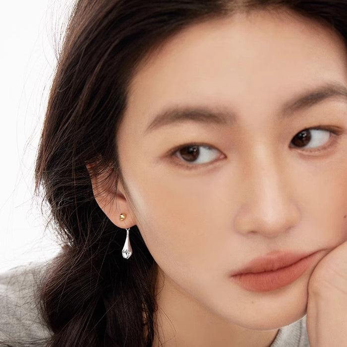 Wholesale Retro contrasting water droplet earrings with niche design, high-end sense, simple personality, fashionable temperament, silver plated earrings