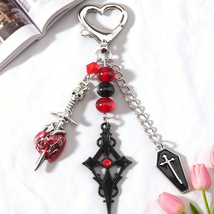 Wholesale Y2K Dark Style Cross Raccoon Butterfly Arrow Through Heart Keychain Pendant Zinc Alloy Boutique Resale Accessory