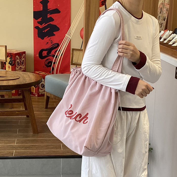 Wholesale Artistic lazy canvas bag, casual versatile shoulder bag, large capacity tote bag