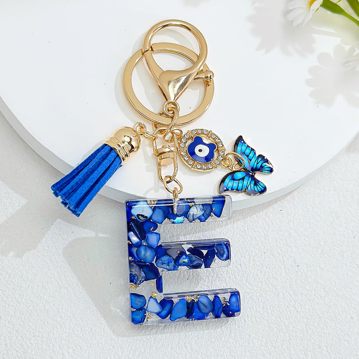 Wholesale Royal Blue 26 Letter Keychain with Evil Eye Butterfly Tassel Pendant