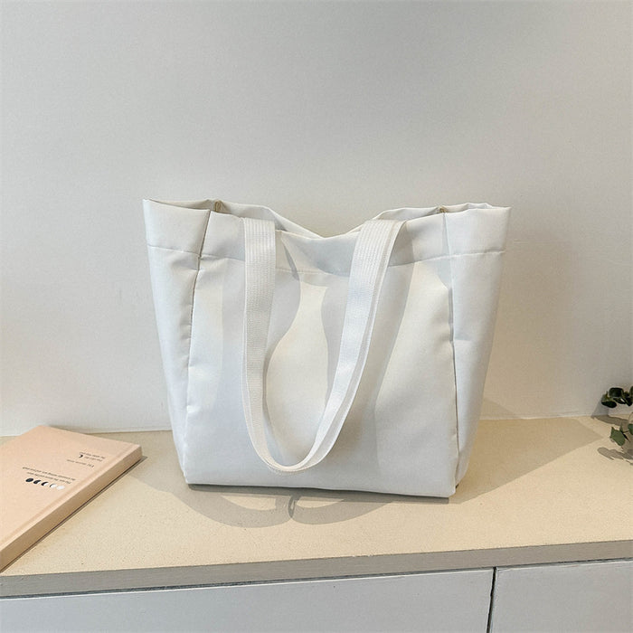 Wholesale Solid color large capacity canvas shoulder bag, simple commuting tote bag, shopping bag