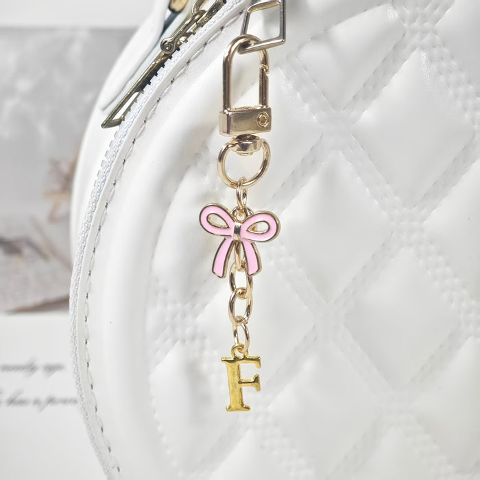 Wholesale Pink bow A-Z keychain alloy accessory