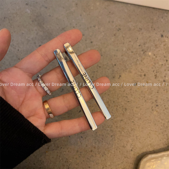 Wholesale Metallic style letter shaped hair clip with fashionable side bangs and ponytail accessories