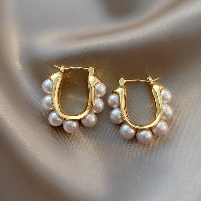 Wholesale Retro high-end pearl earrings, fashionable and simple U-shaped ear buckles, personalized and niche temperament earrings
