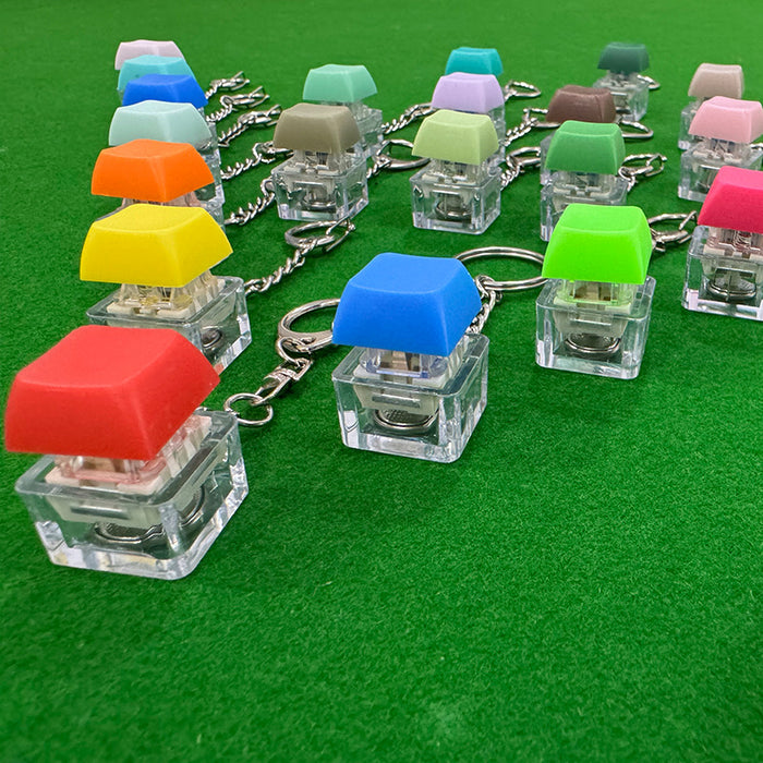 Wholesale Decompression keychain pendant, button tester, color illuminated decompression keychain