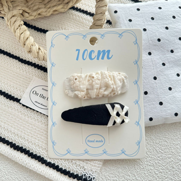 Wholesale Sweet bow hair clip with water droplets, wavy dots, children's fabric, side broken hair, wavy dots, bangs clip