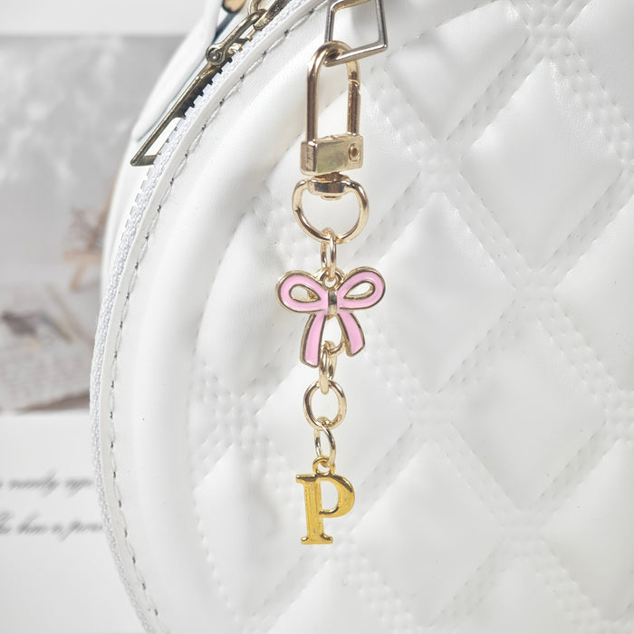 Wholesale Pink bow A-Z keychain alloy accessory