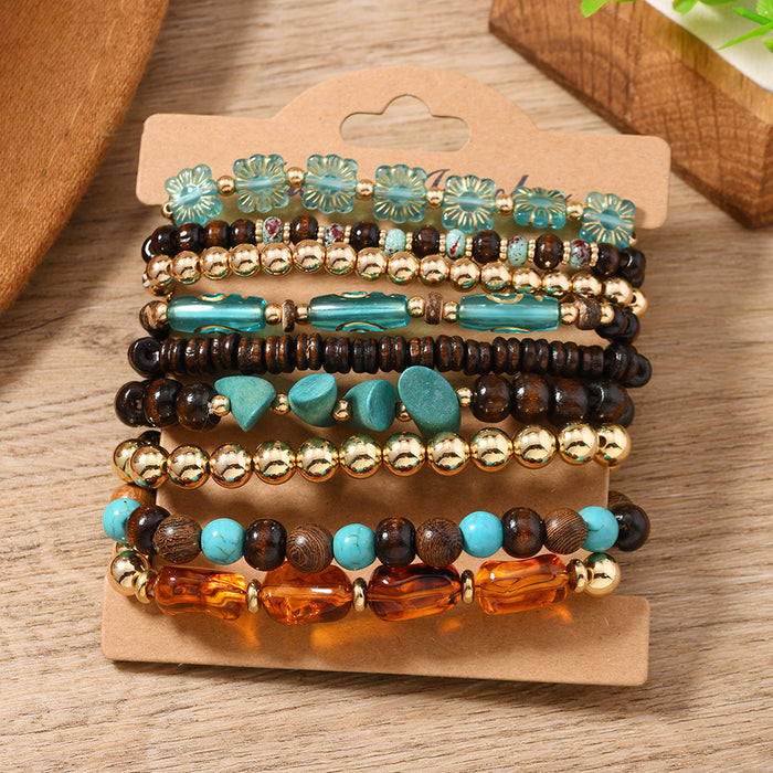 Wholesale Women' s stackable set of 9 wooden and acrylic beaded handmade bracelets.
