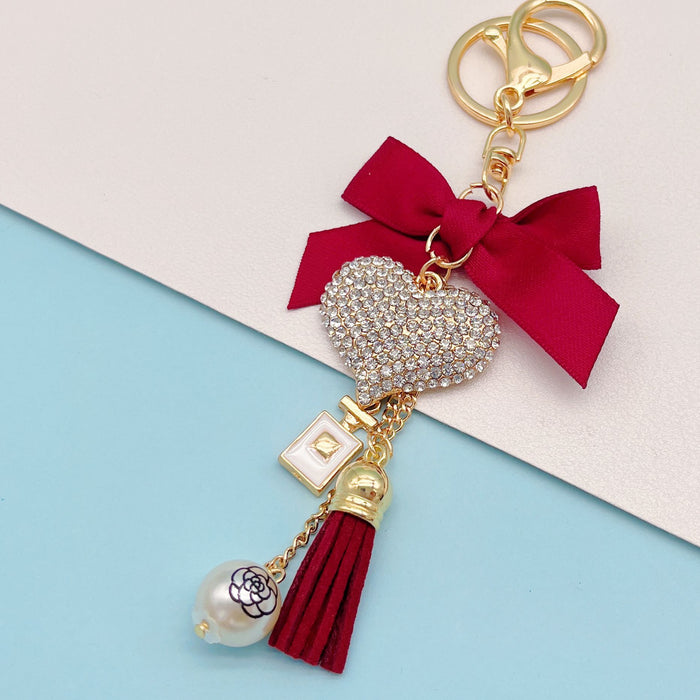 Wholesale Bow Perfume Bottle Tassel Rhinestone Heart Zinc Alloy Keychain JDC-KC-ZhanLun009