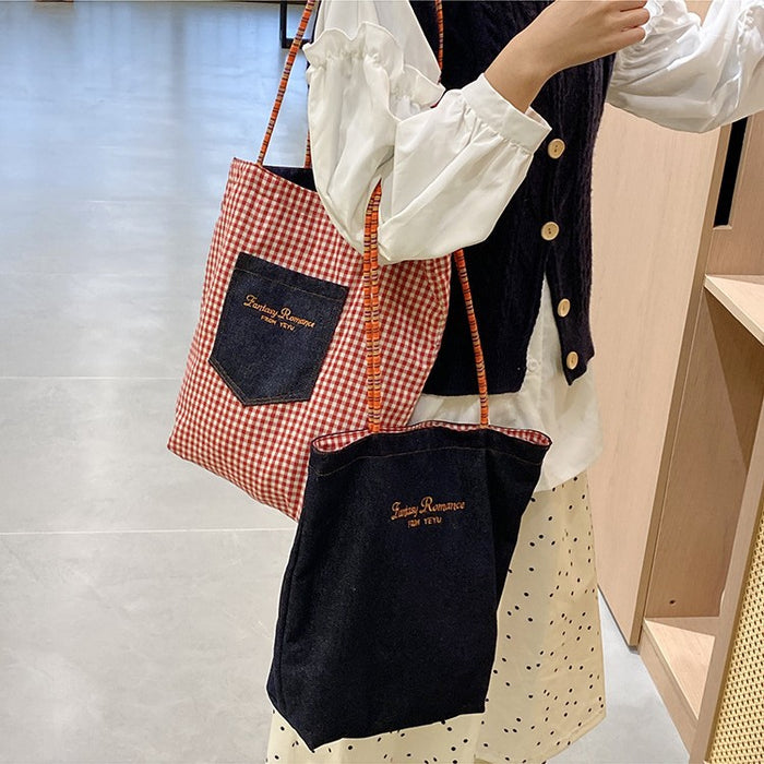 Wholesale Double sided denim shoulder bag, fashionable large capacity hand-held canvas bag, retro tote bag