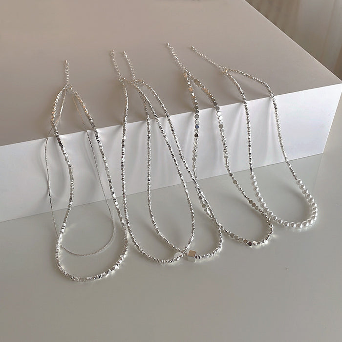 Wholesale Broken silver necklace for women with a niche design, personalized simplicity, versatile temperament, fashionable double-layer pearl necklace, collarbone chain
