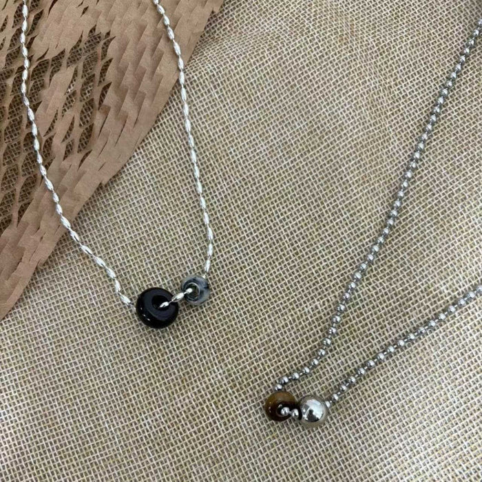 Wholesale Simple natural stone donut water droplet tiger eye pendant necklace, niche high-end sweater chain