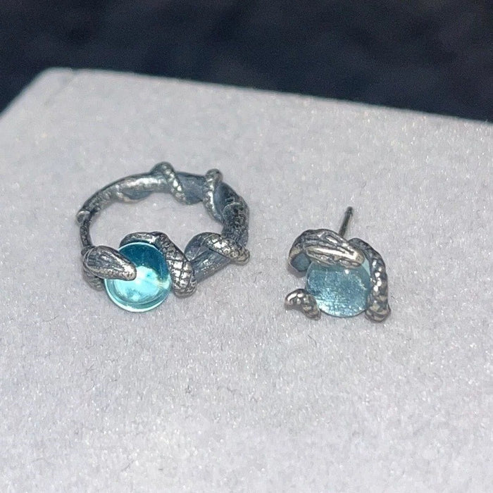 Wholesale Silver snake wrapped imitation moonstone ear buckle, light luxury, niche high-end design, spirit snake earrings, versatile earrings