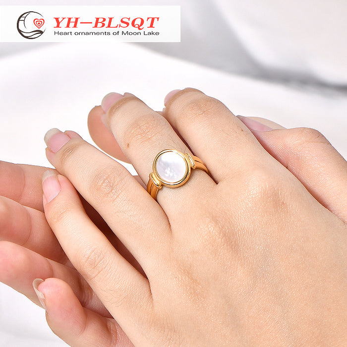 Wholesale Roman arc white shell fritillary oval ring titanium steel