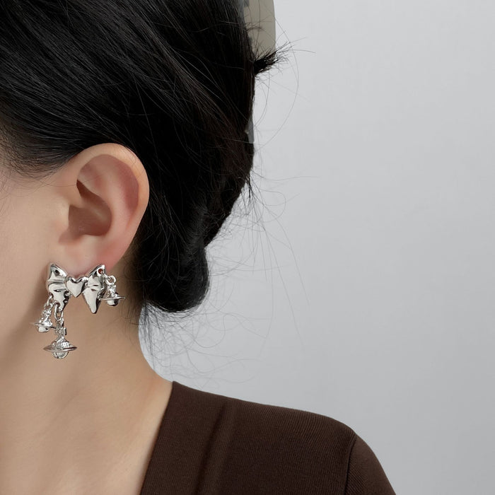 Wholesale Fashionable design earrings, personalized bow, metal, exaggerated personality