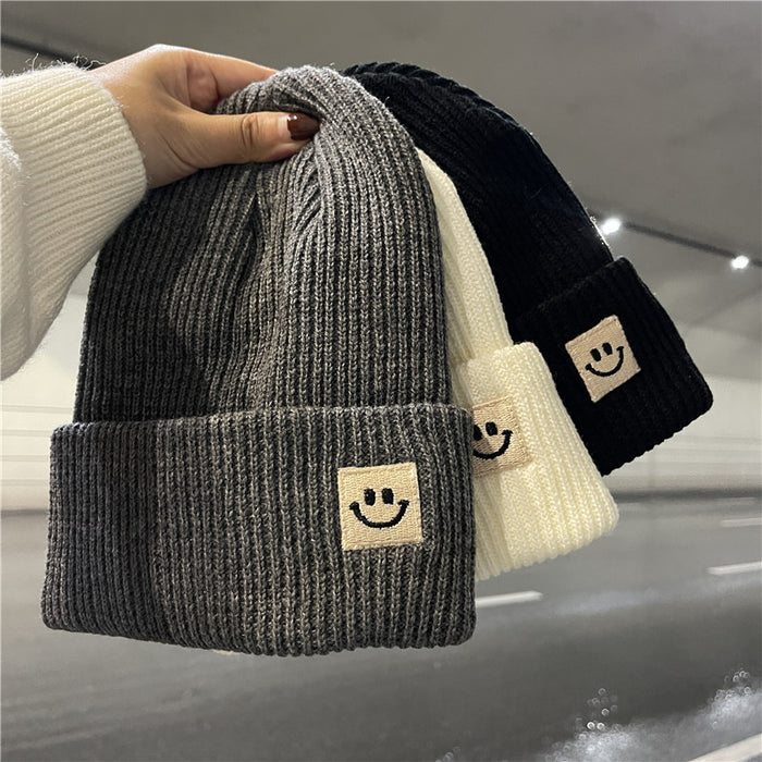 Wholesale Autumn and Winter Cute Smiley Face Logo Wool Knitted Hat JDC-FH-Yizhan002