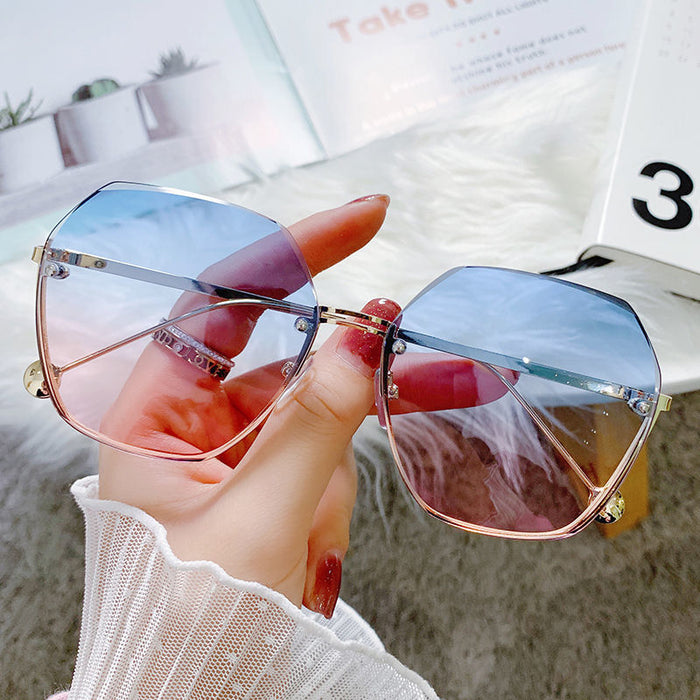 Wholesale Rimless Edge-Cut Summer Big Face Slimming Glasses Sunglasses for Women with a High-End Feel