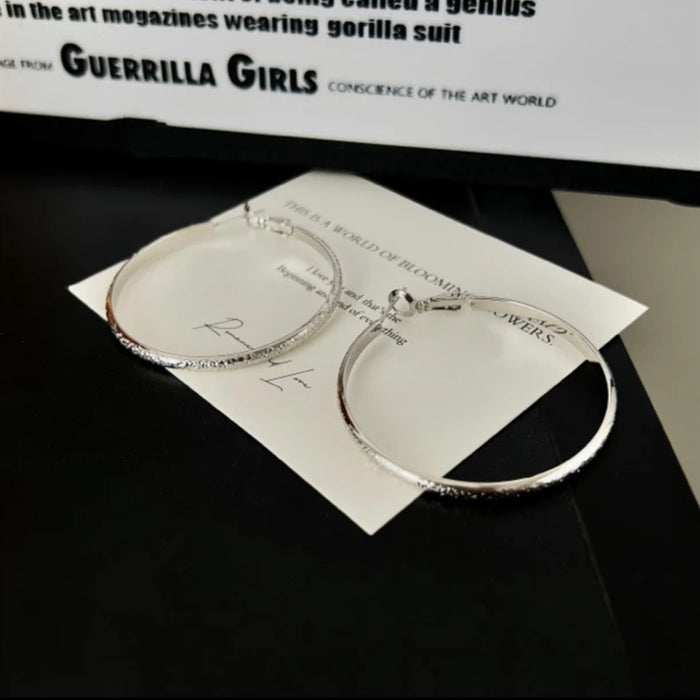 Wholesale Silver ring earrings with light luxury earrings, simple and versatile earrings for women