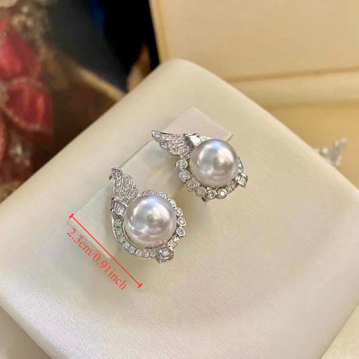 Wholesale Specially designed for niche angel wings, light luxury pearl earrings accessories, high-end pearl earrings
