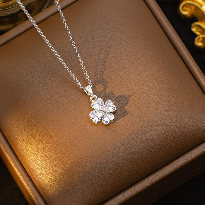 Wholesale Copper-set zircon four-leaf clover colored Titanium steel pendant necklace and earring set