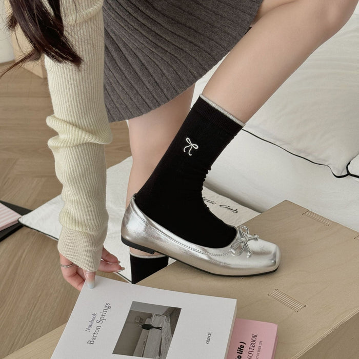 Wholesale Color blocked embroidery bow pile socks